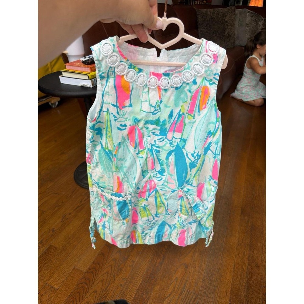 Lilly Pulitzer kids dress features a colorful "Beach and Bae" sailboat print 7
